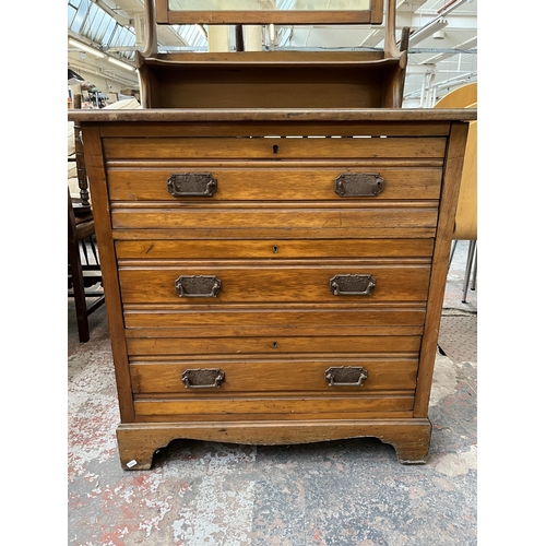 165 - An Edwardian satinwood dressing chest with three drawers and upper mirror