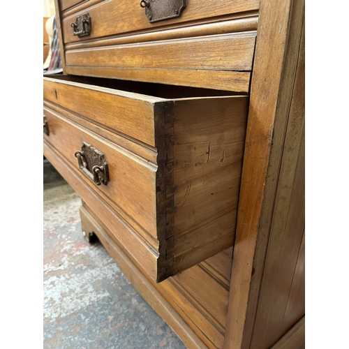 165 - An Edwardian satinwood dressing chest with three drawers and upper mirror