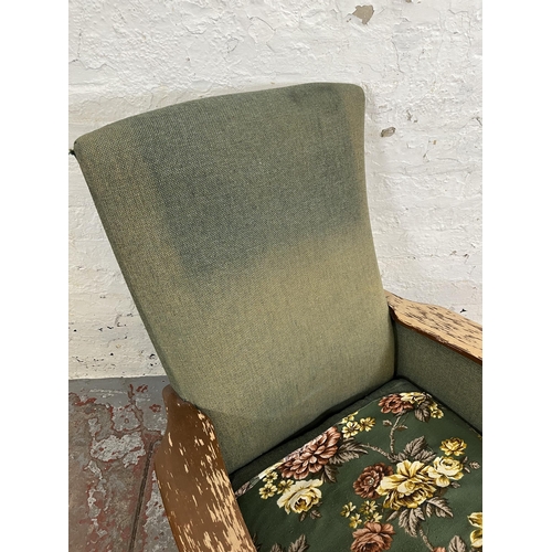 166 - A 1960s Parker Knoll PK988 beech and green fabric upholstered armchair