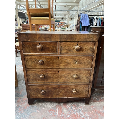 169 - A Victorian mahogany chest of two short over three long drawers