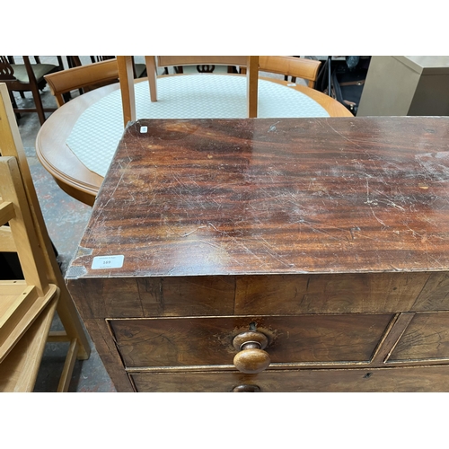 169 - A Victorian mahogany chest of two short over three long drawers