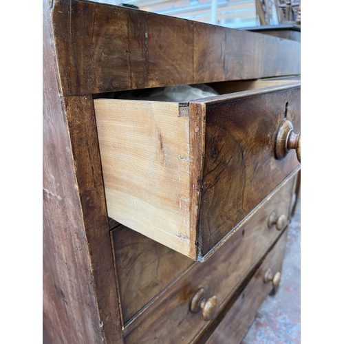 169 - A Victorian mahogany chest of two short over three long drawers