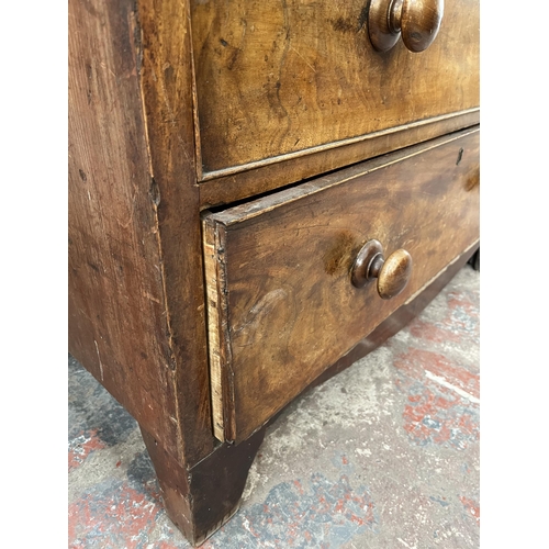 169 - A Victorian mahogany chest of two short over three long drawers