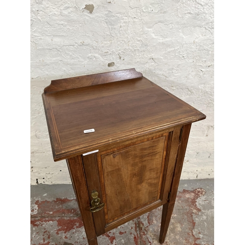 170 - An Edwardian Marsh Jones Cribb & Co. inlaid mahogany bedside cabinet