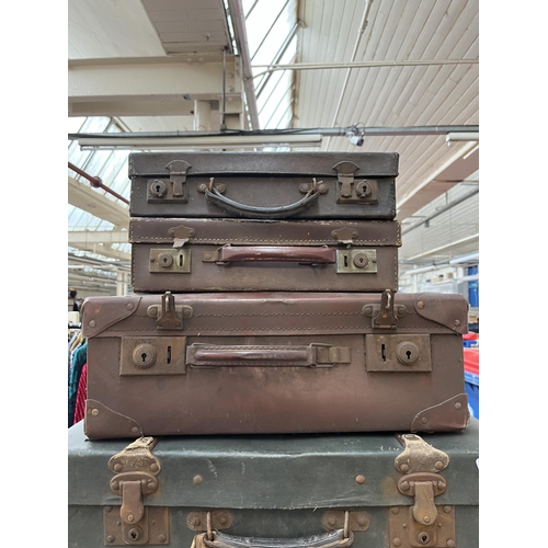 174 - Six early/mid 20th century suitcases