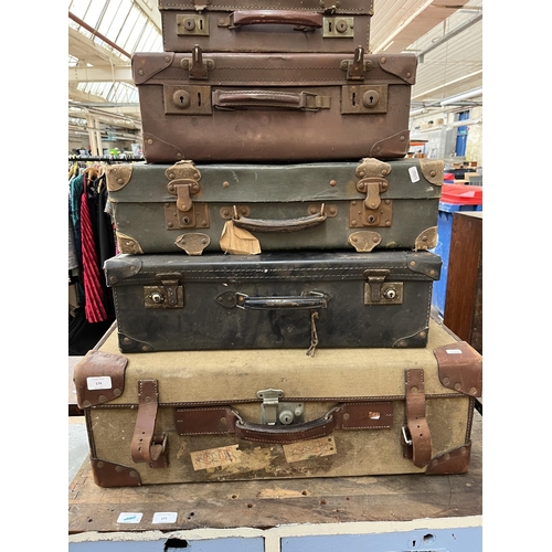 174 - Six early/mid 20th century suitcases