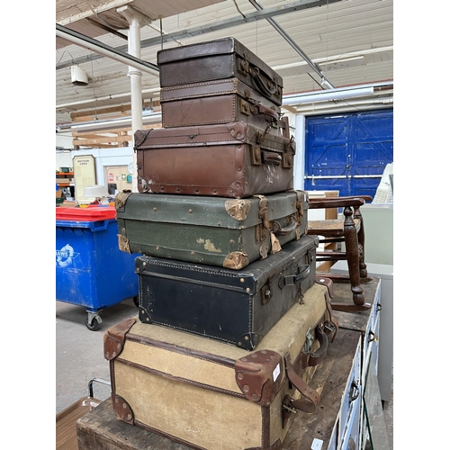 174 - Six early/mid 20th century suitcases