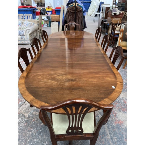 201 - A Lowe's of Loughborough Regency style mahogany and yew wood crossbanded triple pedestal extending D... 