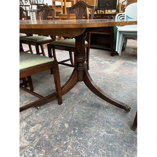 201 - A Lowe's of Loughborough Regency style mahogany and yew wood crossbanded triple pedestal extending D... 