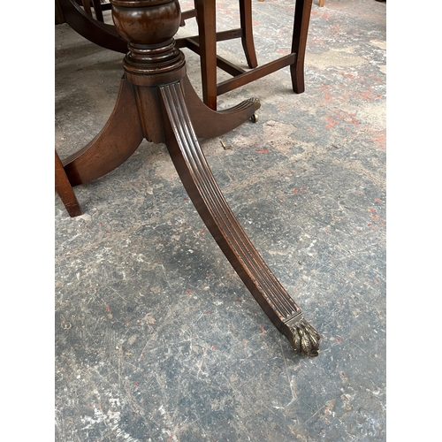 201 - A Lowe's of Loughborough Regency style mahogany and yew wood crossbanded triple pedestal extending D... 