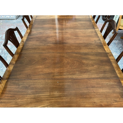 201 - A Lowe's of Loughborough Regency style mahogany and yew wood crossbanded triple pedestal extending D... 