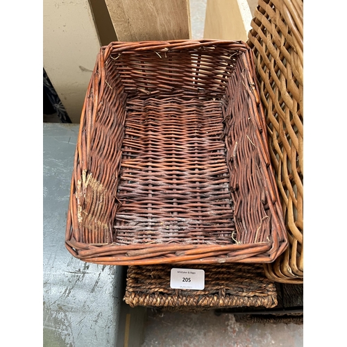 205 - Five wicker items, three baskets and two chests of drawers