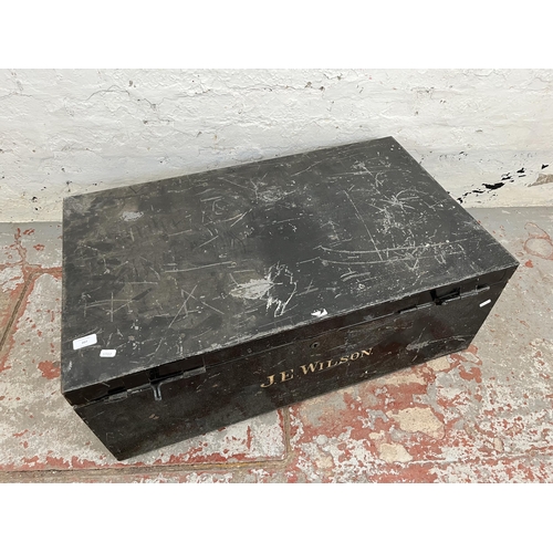 207 - An early 20th century black metal travel trunk