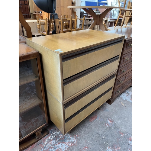 62 - A Meredew walnut chest of four drawers