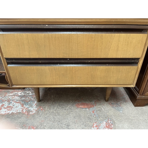 62 - A Meredew walnut chest of four drawers