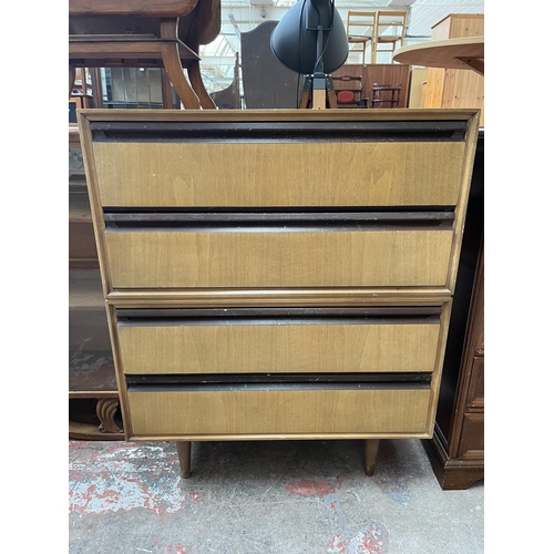 62 - A Meredew walnut chest of four drawers