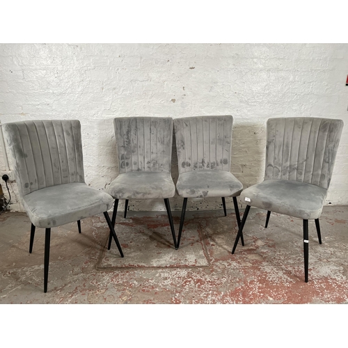 67 - A set of four Dunelm grey fabric upholstered dining chairs with black metal splayed supports