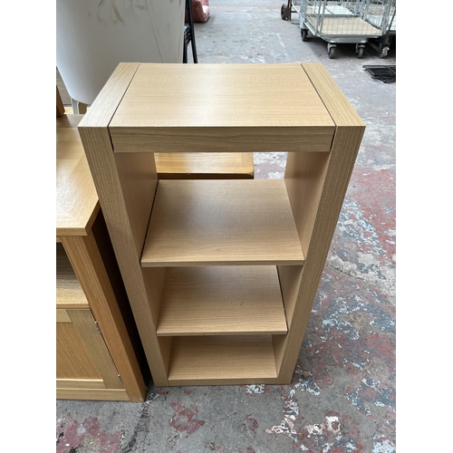 70 - Four pieces of modern oak effect furniture, two side tables, one TV stand and one shelving unit