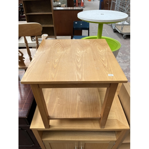 70 - Four pieces of modern oak effect furniture, two side tables, one TV stand and one shelving unit