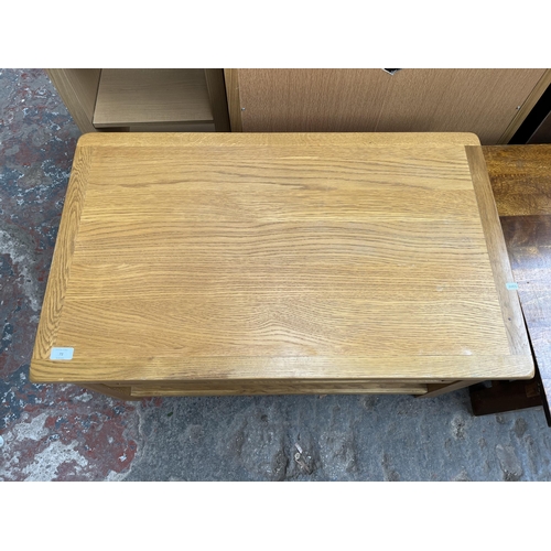 72 - A modern oak rectangular two tier coffee table with single drawer - approx. 47cm high x 90cm wide x ... 