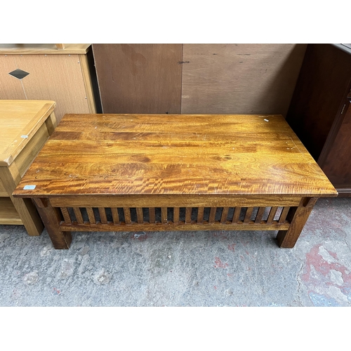 75 - A modern acacia wood rectangular coffee table