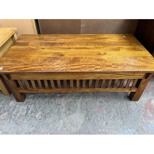 75 - A modern acacia wood rectangular coffee table