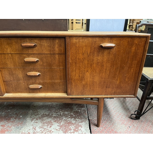 85 - A 1960s G Plan Brasilia teak sideboard - approx. 789cm high x 206cm wide x 45.5cm deep