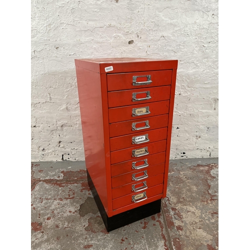 91 - A red metal ten drawer filing cabinet