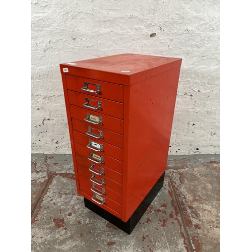 91 - A red metal ten drawer filing cabinet