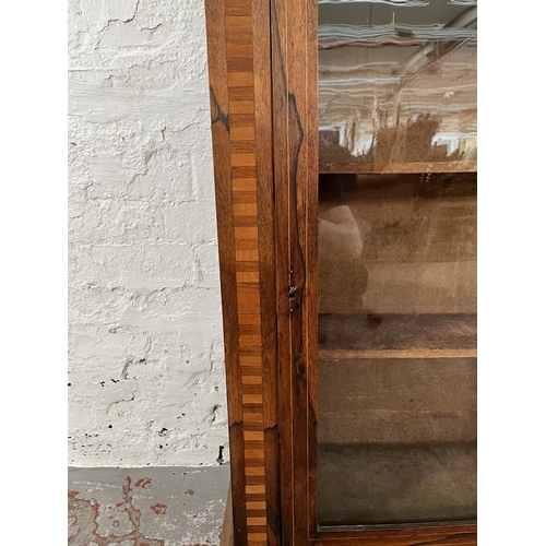 93 - A Victorian inlaid walnut and rosewood pier cabinet