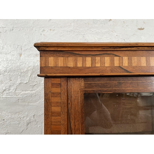 93 - A Victorian inlaid walnut and rosewood pier cabinet