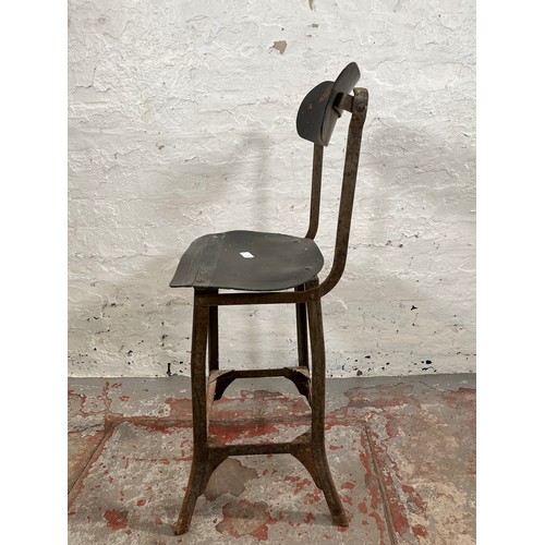 112A - A 1950s Tan Sad style metal and fibreboard industrial machinist's chair - approx. 88cm high