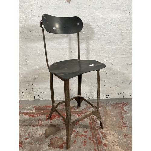 112B - A 1950s Tan Sad style metal and fibreboard industrial machinist's chair - approx. 88cm high