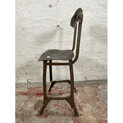 112B - A 1950s Tan Sad style metal and fibreboard industrial machinist's chair - approx. 88cm high