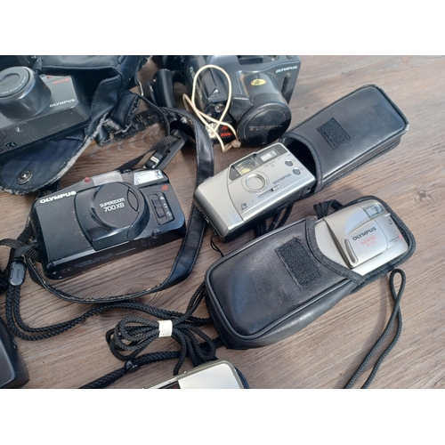 593 - A large collection of Olympus compact cameras to include µ[mju:] ZOOM 105, three AZ-300 Superzoom, A... 