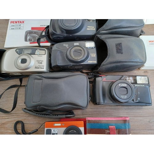 596 - Nine Pentax cameras to include Optio H90 12.1mp digital, Espio 738, Espio 115V, Espio AF Zoom, Espio... 