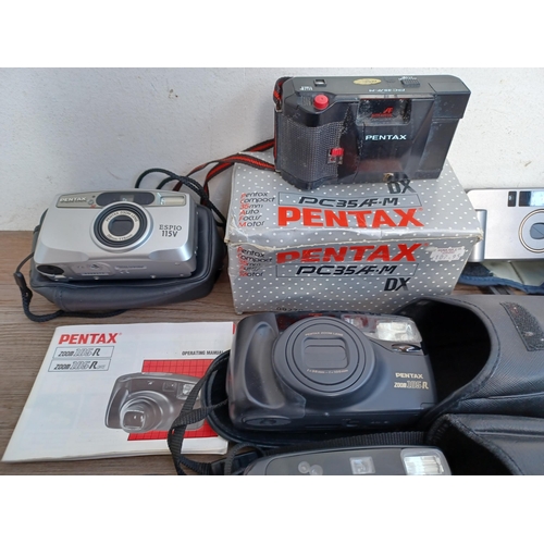 596 - Nine Pentax cameras to include Optio H90 12.1mp digital, Espio 738, Espio 115V, Espio AF Zoom, Espio... 