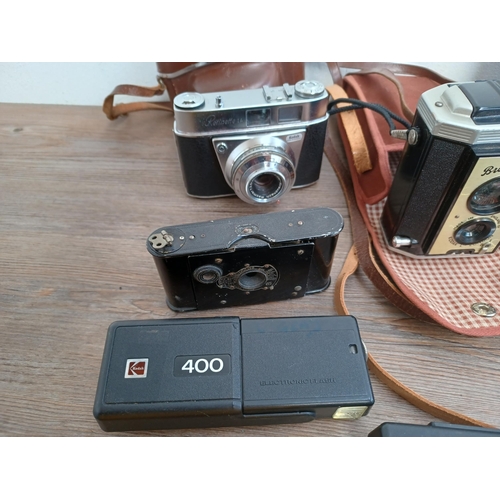 599 - Eleven Kodak cameras to include boxed 66 model II folding for 120 film with instruction manual, case... 