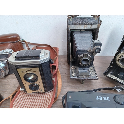 599 - Eleven Kodak cameras to include boxed 66 model II folding for 120 film with instruction manual, case... 