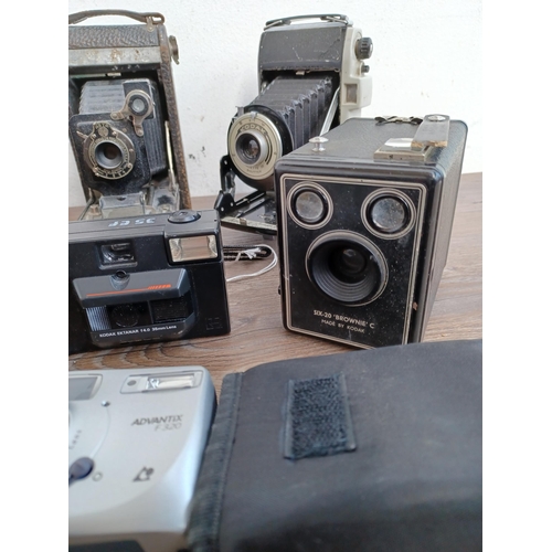 599 - Eleven Kodak cameras to include boxed 66 model II folding for 120 film with instruction manual, case... 