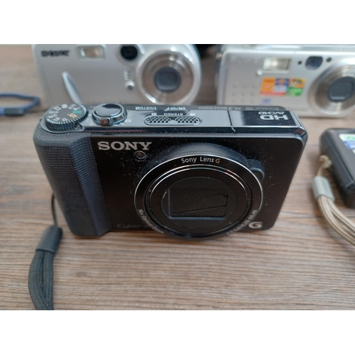 603 - Five Sony compact digital cameras to include Cyber-shot DSC-WX350 18.2mp, DSC-HX9V 16.2mp, DSC-W310 ... 