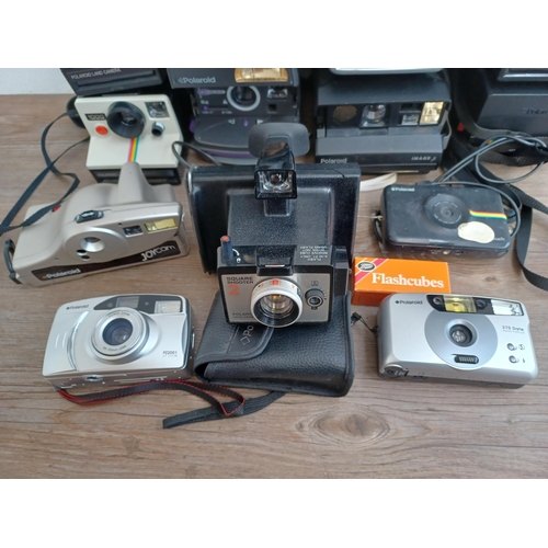 612 - A collection of Polaroid cameras to include Square Shooter 2, One600, Supercolor 635CL, Image 2 etc.