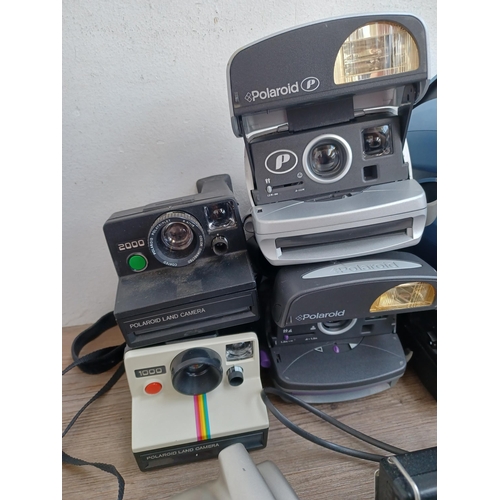 612 - A collection of Polaroid cameras to include Square Shooter 2, One600, Supercolor 635CL, Image 2 etc.