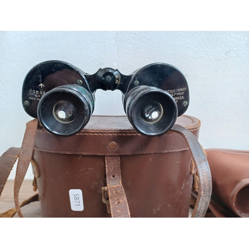 614 - Two pairs of binoculars, one 1943 Canadian made WWII British Army issue REL CGB 53 GA 6 x 30 and one... 