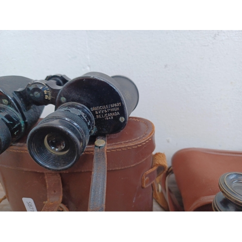 614 - Two pairs of binoculars, one 1943 Canadian made WWII British Army issue REL CGB 53 GA 6 x 30 and one... 