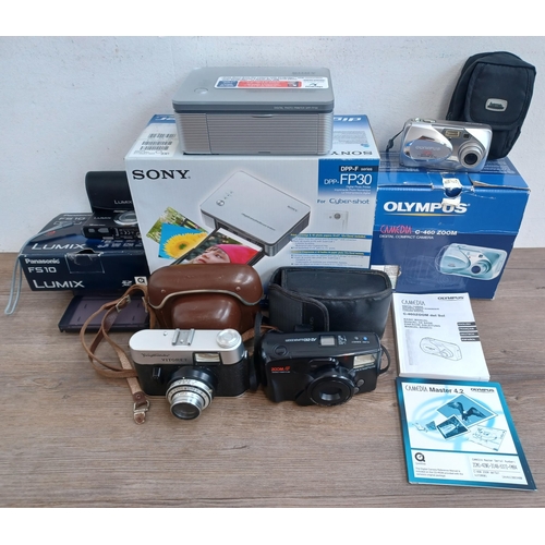 615 - Five cased items, one boxed Panasonic Lumix FS10 12.1mp compact digital camera, one boxed Sony DPP-F... 