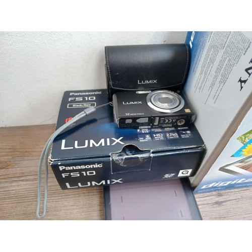 615 - Five cased items, one boxed Panasonic Lumix FS10 12.1mp compact digital camera, one boxed Sony DPP-F... 