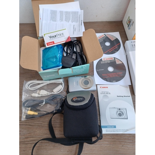 618 - Four items, one boxed and cased Canon IXUS 95IS 10mp compact digital camera with charger, cables, so... 