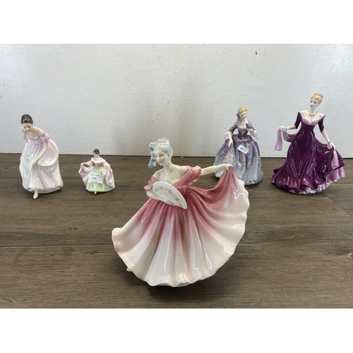 310 - Five Royal Doulton figurines, Sarah HN 3219, Danielle HN 3001, Nicola HN 2839, Ellie HN 4017 and Ela... 