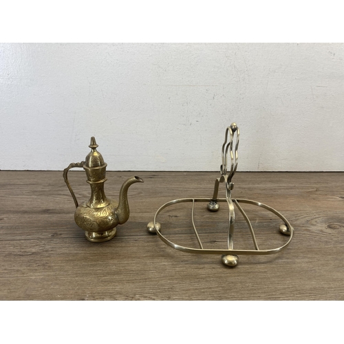 331 - A collection of brassware to include Berry & Warmington Ltd. cast iron weighing scales with brass pa... 